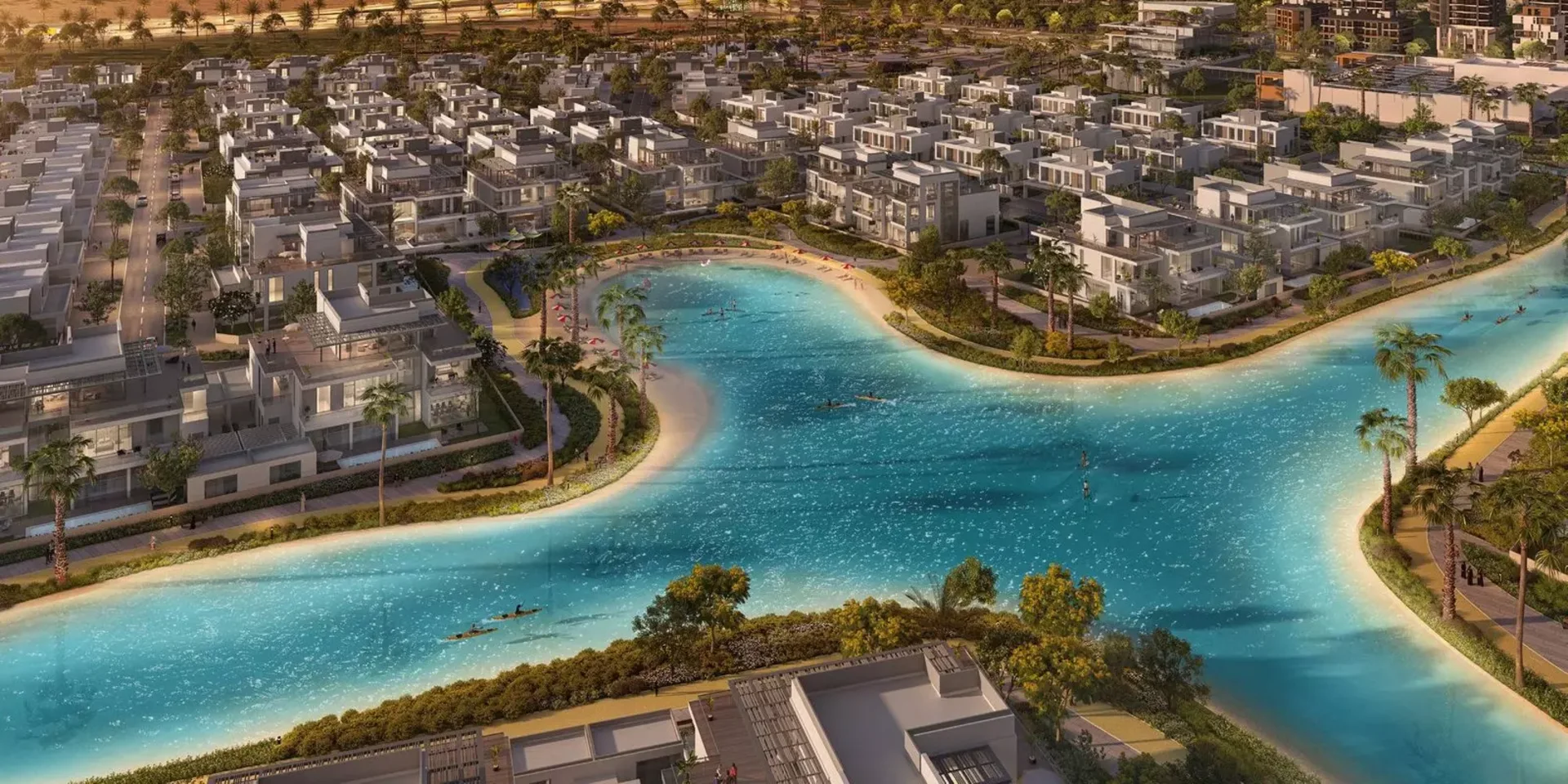 Luftaufnahme von The Pulse in Dubai South, Townhouse-Reihen rund um die schwimmbare Lagune