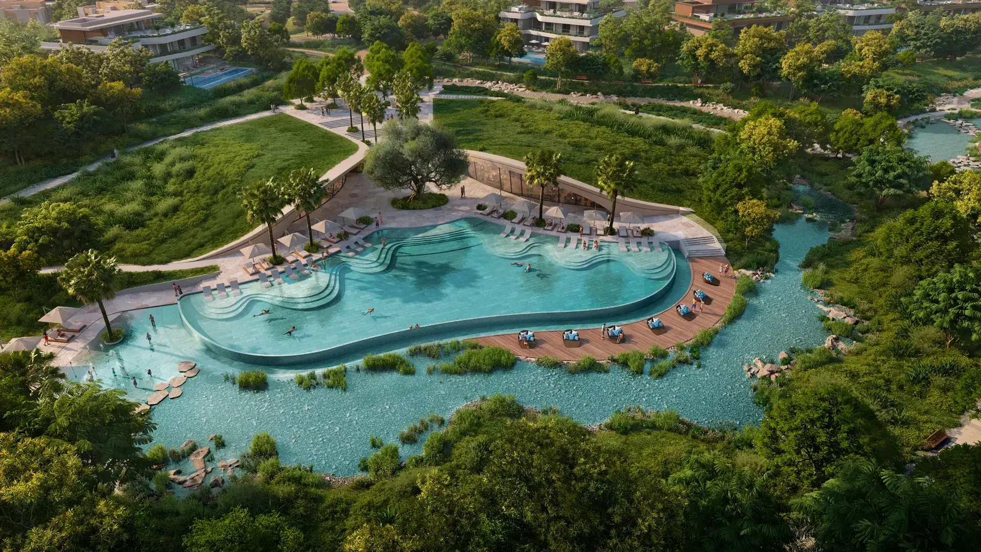 The Wilds by Aldar, a free-form pool and stream running through dense planting